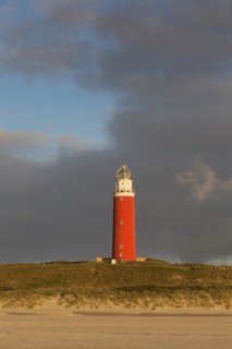 Eierland Lighthouse in the dunes during stormy weather on the northernmost tip of the Dutch island of Texel