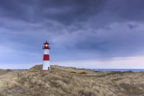 Red and white striped lighthouse List East