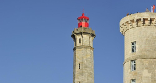 The old Tour Vauban and the new lighthouse Phare des Baleines on the island Ile de Re