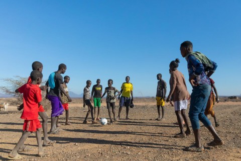 Group of young men playing football