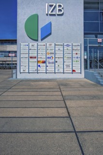 Information board with logos at the development company IZB mbH