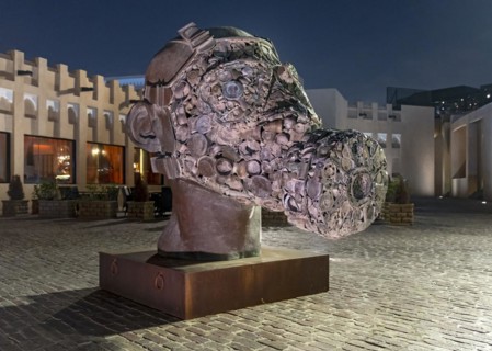 Head with gas mask statue
