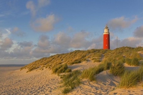 Eierland Lighthouse in the dunes on the northernmost tip of the Dutch island of Texel