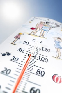 Worm's-eye view of thermometer measures extremely hot temperature of 40 degrees Celsius