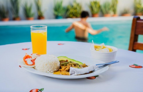 Traditional breakfast served poolside. Traditional morning breakfast near the swimming pool