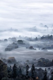 View from the Zeller Horn on misty landscape of the Swabian Alb
