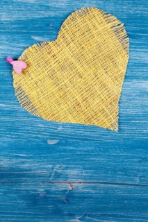 Linen heart on blue background