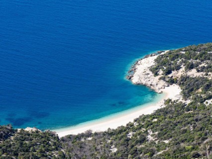 View of the blue sea and the sandy beach