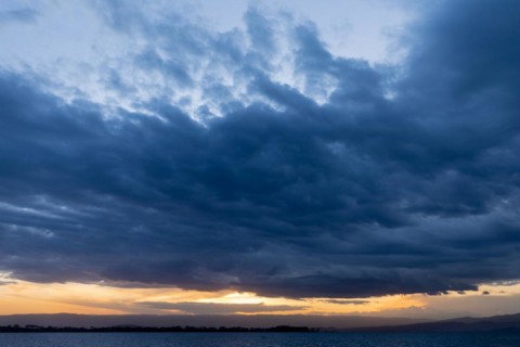 Sea of clouds over a lake