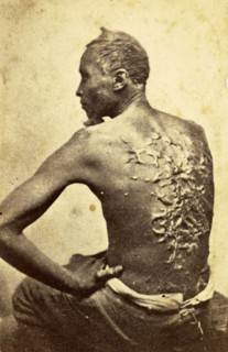 Carte-de-visite of a formerly enslaved man identified only as Private Gordon. Gordon is seated
