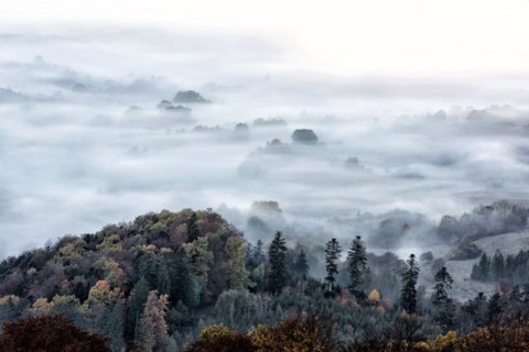 View from the Zeller Horn on misty landscape of the Swabian Alb