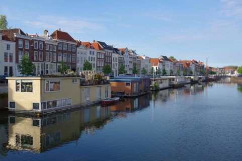 Houseboats and houses on a canal in Middelburg