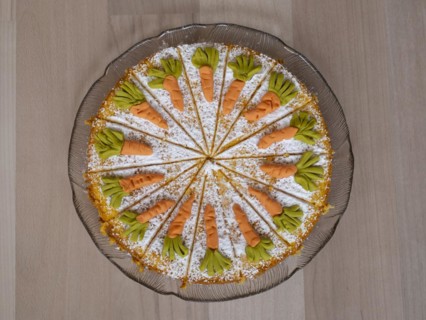 Homemade carrot cake on a glass plate