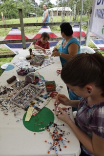 Costa Rican woman made key rings from old newspapers