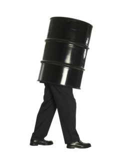 Man and oil barrel