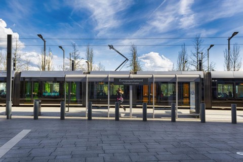 Pedestrian at tram stop