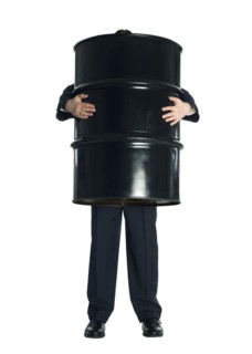 Man and oil barrel