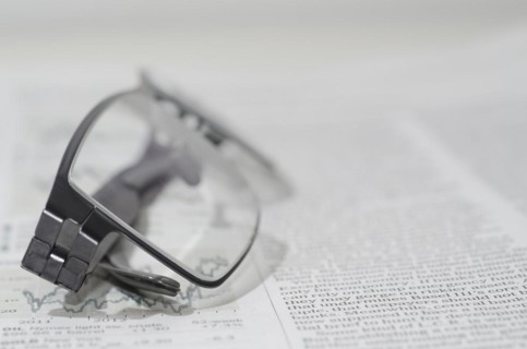 Financial Newspaper and Eyeglasses