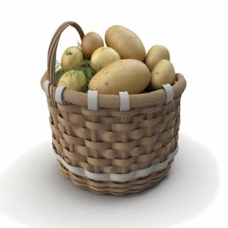 A bast basket with potatoes