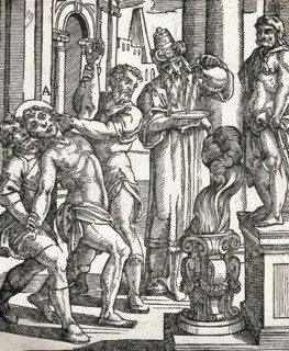 A torture victim is about to have his hand put into an open flame while a priest looks on