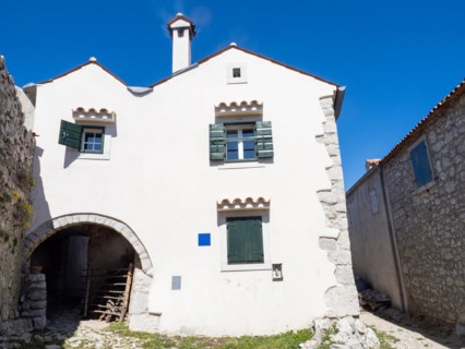 Old houses in the mountain village of Lubenice