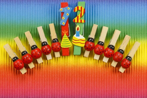 Clothes pegs and number 12