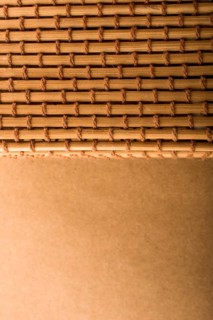 Straw mat and brown background for background usage