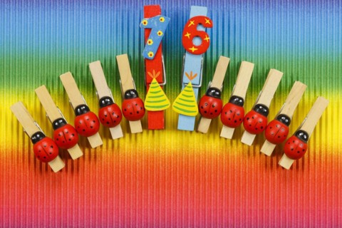 Clothes pegs and number 16