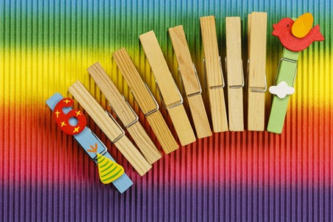 Clothes pegs and number 6