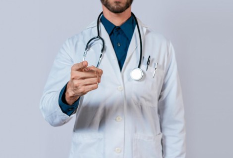 Doctor hand pointing at you isolated. Unrecognizable doctor pointing fingers at you