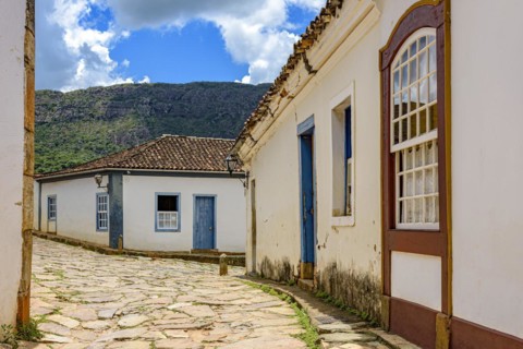 Old town street with historic colonial style houses in the city of Tiradentes in the interior of the state of Minas Gerais