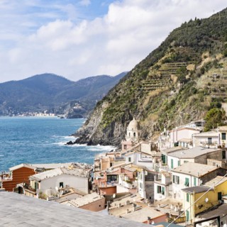 Scenic view of ocean and Vernazza village located in Cinque Terre