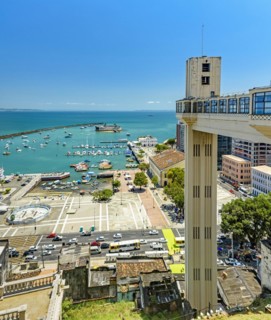 Panoramic view of the bay of All Saints with boats and Lacerda elevator in the city of Salvador in Bahia on a sunny day.