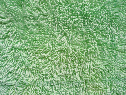 Green carpet texture background