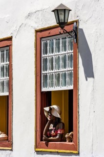 Window decorated with flowers and objects in the historic historic city of Diamantina in a typical scene of the interior of the state of Minas Gerais