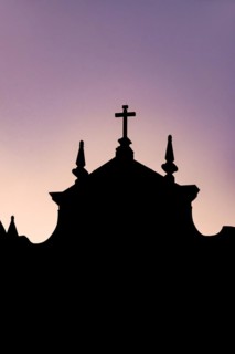 Silhouette of a colonial-style historic church during sunset in the Pelourinho neighborhood in the city of Salvador