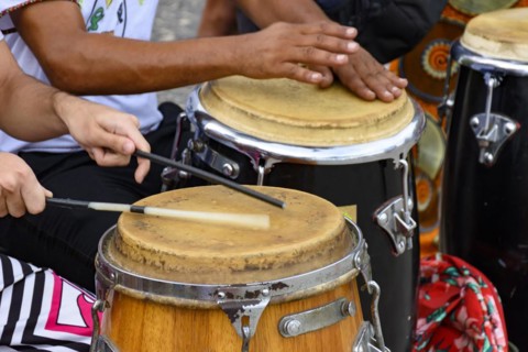 Percussion instrument called atabaque being played in traditional Brazilian samba party