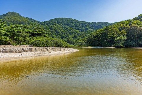 River waters flowing down between hills