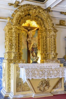 Altar of ancient and historic baroque church gold leaf with the image of Jesus Christ in the city of Salvado in Bahia