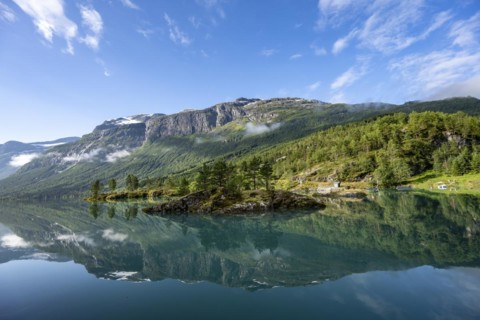 Mountains reflected in blue lake