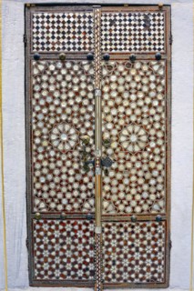 Portal with wood and mother-of-pearl mosaic inside the ancient and famous Topkapi Palace in Istanbul