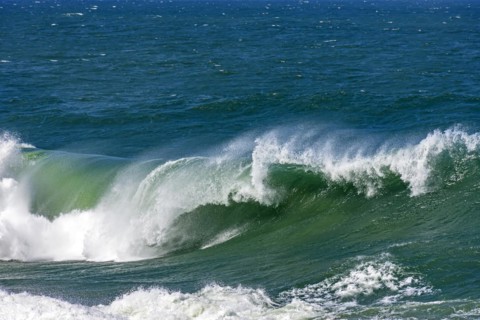 Strong wave breaking hard in the sea waters of Ipanema beach in Rio de Janeiro