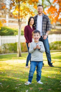 Outdoor portrait of multiethnic chinese and caucasian family