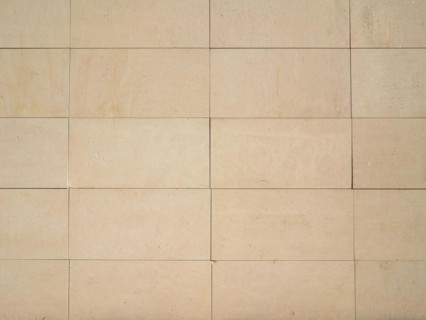 Yellow stone wall background