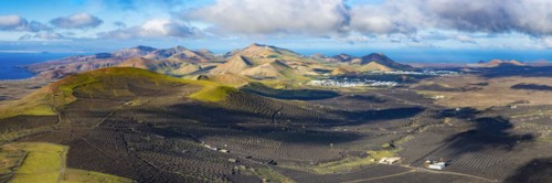 Panorama at sunrise from the Montana de Guardilama to the wine-growing area La Geria