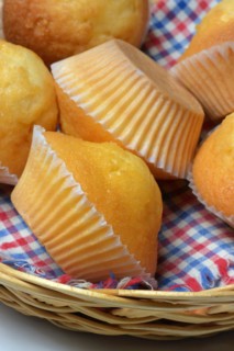 Several muffins in baskets