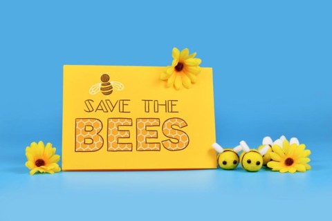 Save the Bees sign with felt bees and yellow flowers