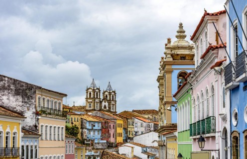 Colorful historical colonial houses facades and antique church towers in baroque and colonial style in the famous Pelourinho district of Salvador
