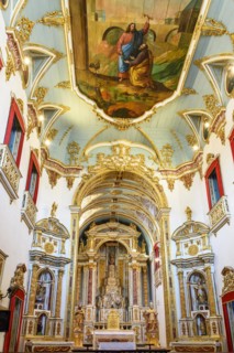 Ceiling and altar of the church of Sao Pedro dos Clerigos created in the 18th century with its neoclassical style interior painted in gold in the Pelourinho neighborhood of Salvador