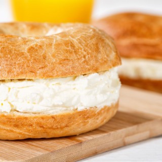 Bagel sandwich for breakfast topped with cream cheese close-up square in Stuttgart